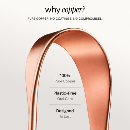 A close up of tongue scraper explaining why copper
